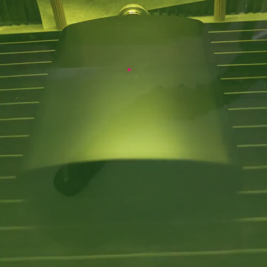 video of laser engraving a design on a flask