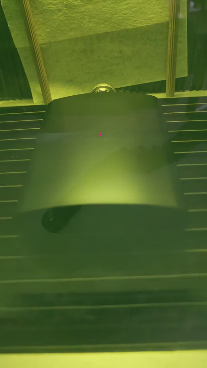 video of laser engraving a design on a flask