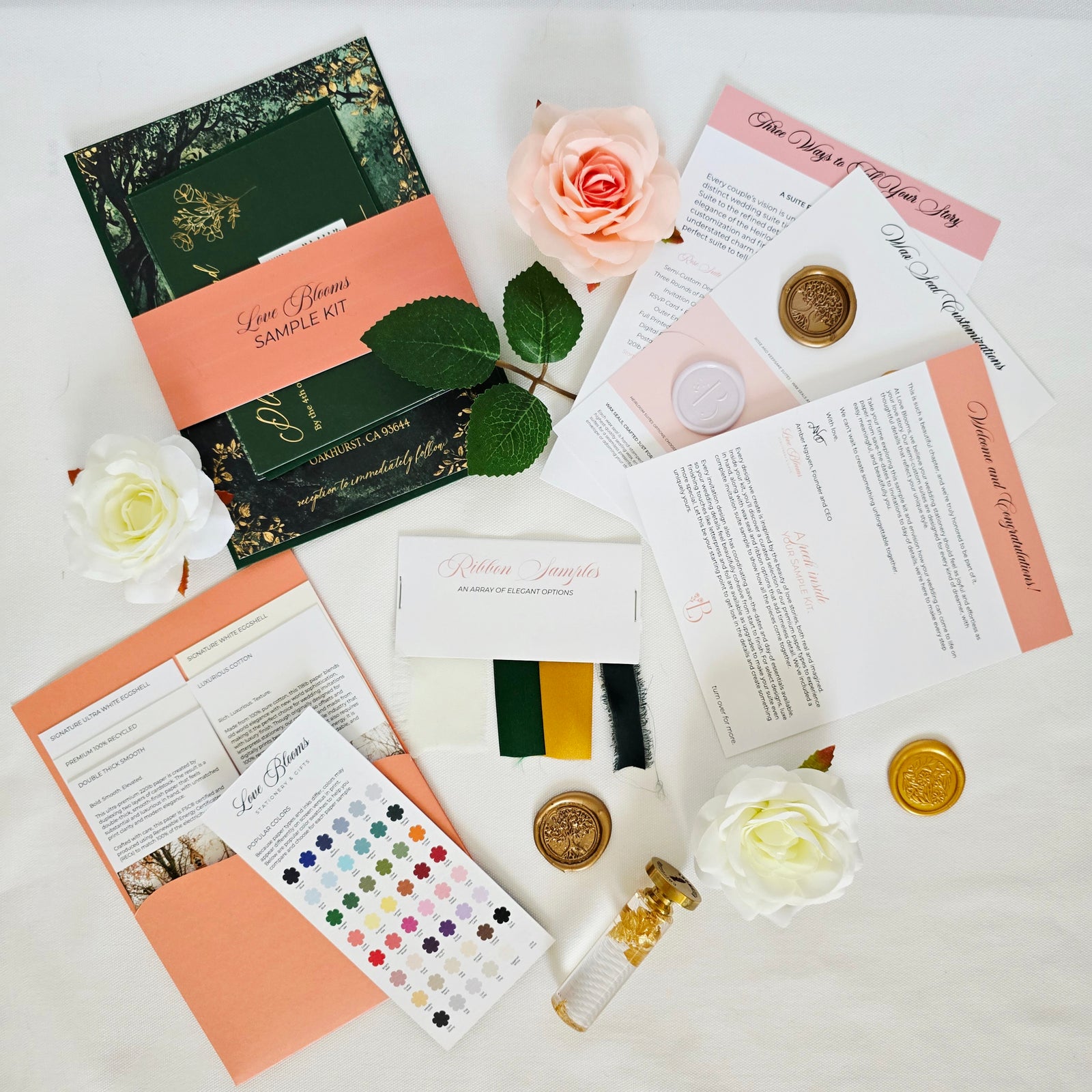 Collection of stationery items including envelopes, cards, and a color swatch on a white background.